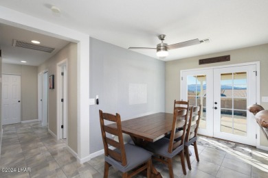 Don't miss the opportunity to own this charming and cozy home on London Bridge Golf Course in Arizona - for sale on GolfHomes.com, golf home, golf lot