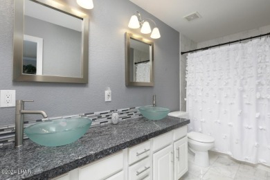 Don't miss the opportunity to own this charming and cozy home on London Bridge Golf Course in Arizona - for sale on GolfHomes.com, golf home, golf lot