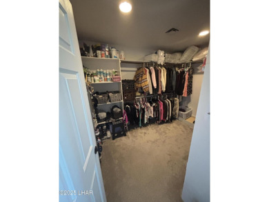 Don't miss the opportunity to own this charming and cozy home on London Bridge Golf Course in Arizona - for sale on GolfHomes.com, golf home, golf lot