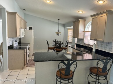 10519 Audie Brook Drive, Spring Hill, FL 34608
$449,000 | 3 Beds on Seven Hills Golfers Club in Florida - for sale on GolfHomes.com, golf home, golf lot
