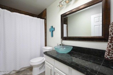 Don't miss the opportunity to own this charming and cozy home on London Bridge Golf Course in Arizona - for sale on GolfHomes.com, golf home, golf lot