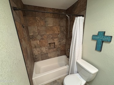 Don't miss the opportunity to own this charming and cozy home on London Bridge Golf Course in Arizona - for sale on GolfHomes.com, golf home, golf lot