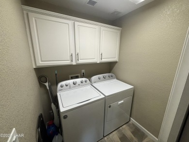 Don't miss the opportunity to own this charming and cozy home on London Bridge Golf Course in Arizona - for sale on GolfHomes.com, golf home, golf lot