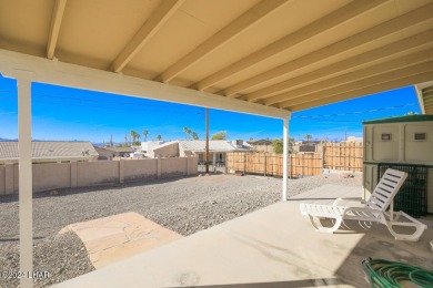 Don't miss the opportunity to own this charming and cozy home on London Bridge Golf Course in Arizona - for sale on GolfHomes.com, golf home, golf lot
