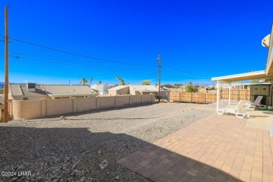 Don't miss the opportunity to own this charming and cozy home on London Bridge Golf Course in Arizona - for sale on GolfHomes.com, golf home, golf lot