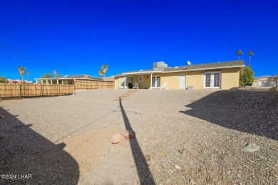 Don't miss the opportunity to own this charming and cozy home on London Bridge Golf Course in Arizona - for sale on GolfHomes.com, golf home, golf lot