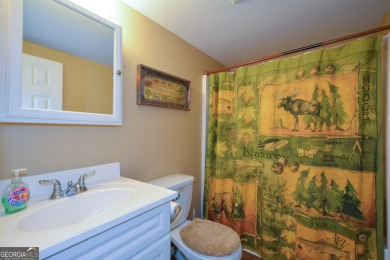 **Charming 5-Bedroom Home with In-Law Suite on 1 Acre of Private on Arrowhead Country Club in Georgia - for sale on GolfHomes.com, golf home, golf lot