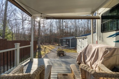 Nestled in the heart of Holiday Out RV Park, this charming on Lake Tansi Village Country Club in Tennessee - for sale on GolfHomes.com, golf home, golf lot