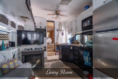 Nestled in the heart of Holiday Out RV Park, this charming on Lake Tansi Village Country Club in Tennessee - for sale on GolfHomes.com, golf home, golf lot