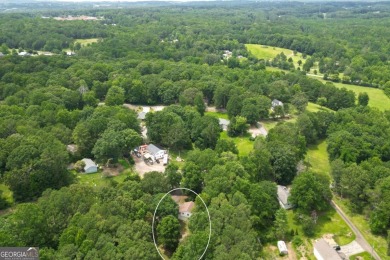 **Charming 5-Bedroom Home with In-Law Suite on 1 Acre of Private on Arrowhead Country Club in Georgia - for sale on GolfHomes.com, golf home, golf lot