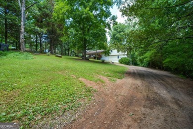 **Charming 5-Bedroom Home with In-Law Suite on 1 Acre of Private on Arrowhead Country Club in Georgia - for sale on GolfHomes.com, golf home, golf lot