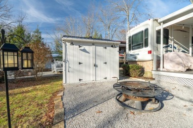 Nestled in the heart of Holiday Out RV Park, this charming on Lake Tansi Village Country Club in Tennessee - for sale on GolfHomes.com, golf home, golf lot