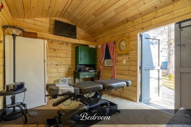 Nestled in the heart of Holiday Out RV Park, this charming on Lake Tansi Village Country Club in Tennessee - for sale on GolfHomes.com, golf home, golf lot