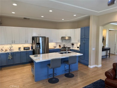 Located in the sought-after 55+ SUN LAKES COUNTRY CLUB, a gated on Sun Lakes Country Club in California - for sale on GolfHomes.com, golf home, golf lot