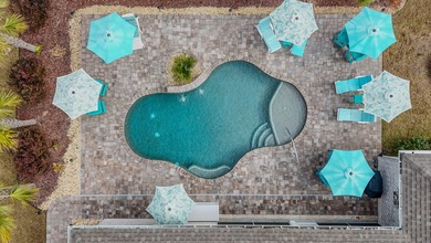 Step into your own private backyard oasis in this stunning on Windswept Dunes Golf Club in Florida - for sale on GolfHomes.com, golf home, golf lot