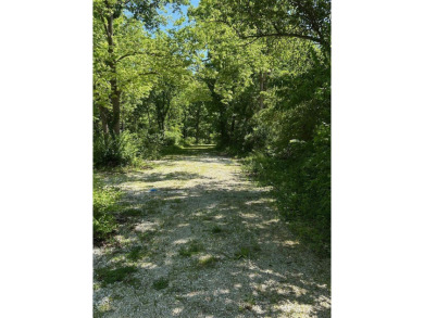 Beautiful 4 acre tract of land located in unincorporated Lincoln on Woods Fort Country Club in Missouri - for sale on GolfHomes.com, golf home, golf lot