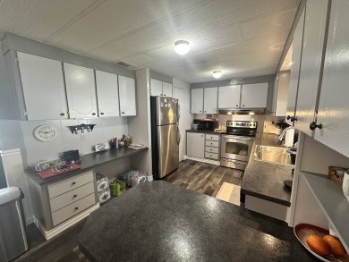 Beautiful 2 bedroom / 2-bathroom cozy home on the 18th tee box! on Lake Fairways Country Club in Florida - for sale on GolfHomes.com, golf home, golf lot