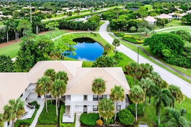 Beautifully updated 2nd-floor residence featuring bold color on Quail Ridge Golf Course and Country Club in Florida - for sale on GolfHomes.com, golf home, golf lot