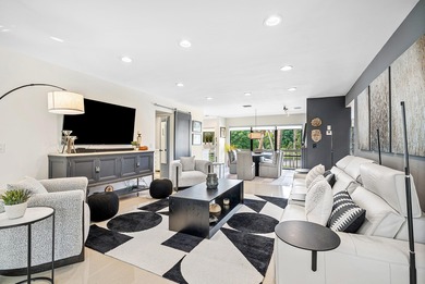 Beautifully updated 2nd-floor residence featuring bold color on Quail Ridge Golf Course and Country Club in Florida - for sale on GolfHomes.com, golf home, golf lot