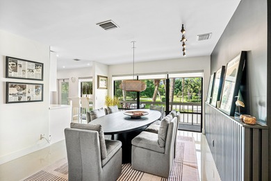 Beautifully updated 2nd-floor residence featuring bold color on Quail Ridge Golf Course and Country Club in Florida - for sale on GolfHomes.com, golf home, golf lot