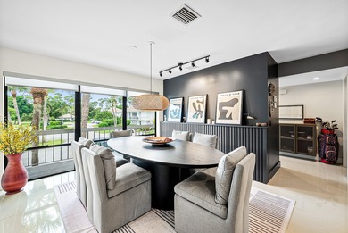 Beautifully updated 2nd-floor residence featuring bold color on Quail Ridge Golf Course and Country Club in Florida - for sale on GolfHomes.com, golf home, golf lot