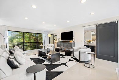 Beautifully updated 2nd-floor residence featuring bold color on Quail Ridge Golf Course and Country Club in Florida - for sale on GolfHomes.com, golf home, golf lot