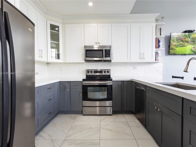 Rare Lakefront Pool Home in Doral Dunes at Doral Park! This on Jim McLean Signature Course in Florida - for sale on GolfHomes.com, golf home, golf lot