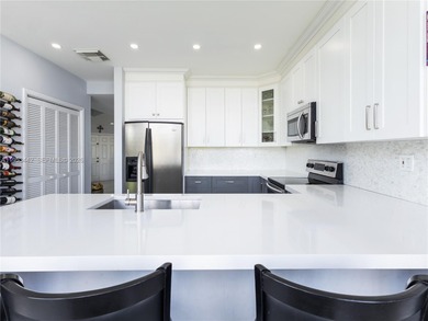 Rare Lakefront Pool Home in Doral Dunes at Doral Park! This on Jim McLean Signature Course in Florida - for sale on GolfHomes.com, golf home, golf lot