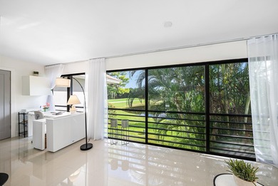 Beautifully updated 2nd-floor residence featuring bold color on Quail Ridge Golf Course and Country Club in Florida - for sale on GolfHomes.com, golf home, golf lot