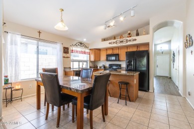 Beautiful single story home with relaxing, idyllic backyard on a on The Golf Club At Johnson Ranch in Arizona - for sale on GolfHomes.com, golf home, golf lot