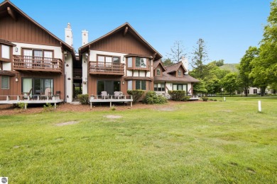 Amazing fully furnished condo with excellent rental history in on Crystal Mountain Golf Course in Michigan - for sale on GolfHomes.com, golf home, golf lot
