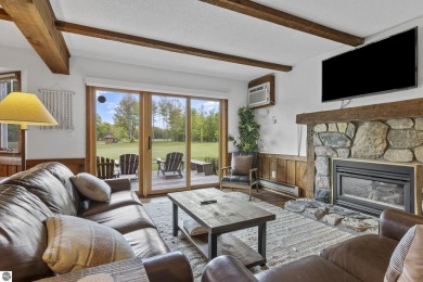 Amazing fully furnished condo with excellent rental history in on Crystal Mountain Golf Course in Michigan - for sale on GolfHomes.com, golf home, golf lot