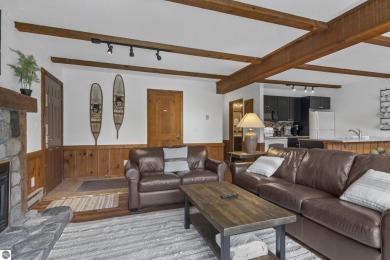 Amazing fully furnished condo with excellent rental history in on Crystal Mountain Golf Course in Michigan - for sale on GolfHomes.com, golf home, golf lot