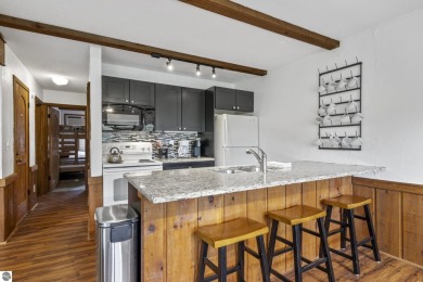 Amazing fully furnished condo with excellent rental history in on Crystal Mountain Golf Course in Michigan - for sale on GolfHomes.com, golf home, golf lot