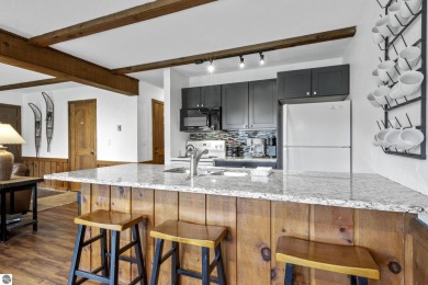 Amazing fully furnished condo with excellent rental history in on Crystal Mountain Golf Course in Michigan - for sale on GolfHomes.com, golf home, golf lot