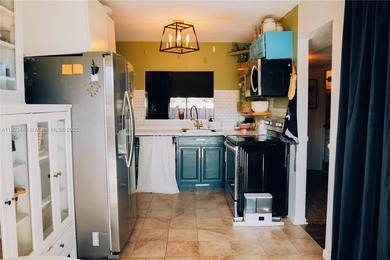 Enjoy golf-course living in The Escape at Arrowhead, one of on Davie Golf Club in Florida - for sale on GolfHomes.com, golf home, golf lot