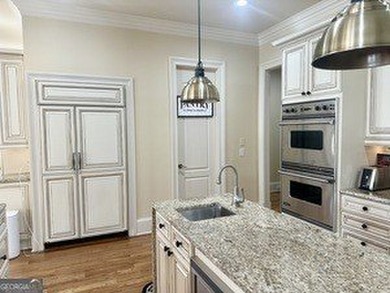 INSTANT EQUITY! Here lies a rare blend comfort and thoughtful on The Governors Towne Club in Georgia - for sale on GolfHomes.com, golf home, golf lot