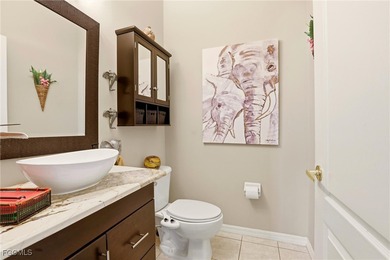 Located at 21543 Brixham Run Loop in the heart of Estero on Stoneybrook Golf Club in Florida - for sale on GolfHomes.com, golf home, golf lot