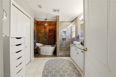 Located at 21543 Brixham Run Loop in the heart of Estero on Stoneybrook Golf Club in Florida - for sale on GolfHomes.com, golf home, golf lot