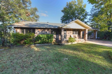 This charming partial lakeview home offers an inviting retreat on Mountain Ranch Golf Club in Arkansas - for sale on GolfHomes.com, golf home, golf lot