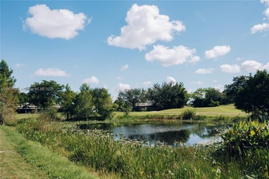 Enjoy golf-course living in The Escape at Arrowhead, one of on Davie Golf Club in Florida - for sale on GolfHomes.com, golf home, golf lot