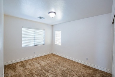 Enjoy resort-style living in this **Upgraded Two-Story on Rhodes Ranch Golf Club in Nevada - for sale on GolfHomes.com, golf home, golf lot