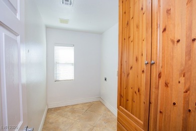 Enjoy resort-style living in this **Upgraded Two-Story on Rhodes Ranch Golf Club in Nevada - for sale on GolfHomes.com, golf home, golf lot