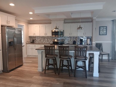 ONE OF A KIND! You OWN the land, no HOA. This 4 bedroom 2 bath on Heritage Ridge Golf Club in Florida - for sale on GolfHomes.com, golf home, golf lot