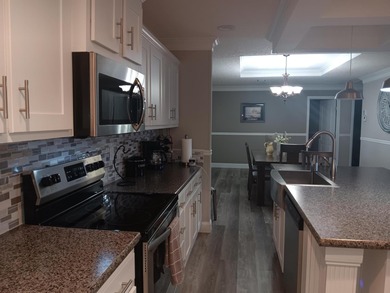 ONE OF A KIND! You OWN the land, no HOA. This 4 bedroom 2 bath on Heritage Ridge Golf Club in Florida - for sale on GolfHomes.com, golf home, golf lot