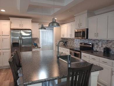 ONE OF A KIND! You OWN the land, no HOA. This 4 bedroom 2 bath on Heritage Ridge Golf Club in Florida - for sale on GolfHomes.com, golf home, golf lot