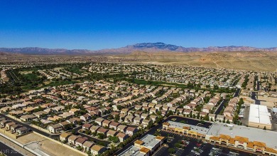 Enjoy resort-style living in this **Upgraded Two-Story on Rhodes Ranch Golf Club in Nevada - for sale on GolfHomes.com, golf home, golf lot