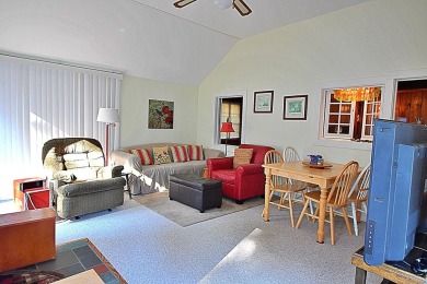 Step into rustic charm with this almost all-knotty pine interior on Birch Pointe Golf Club in Michigan - for sale on GolfHomes.com, golf home, golf lot