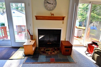 Step into rustic charm with this almost all-knotty pine interior on Birch Pointe Golf Club in Michigan - for sale on GolfHomes.com, golf home, golf lot