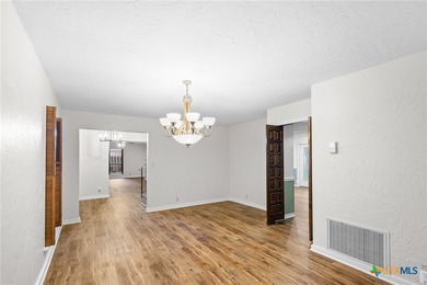 Welcome to this beautifully maintained Spanish-style two-story on Victoria Country Club in Texas - for sale on GolfHomes.com, golf home, golf lot